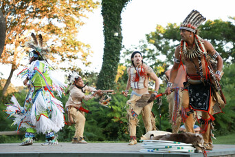 Red hawk dancers perform