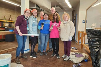 Volunteer staff trustee group clean up day