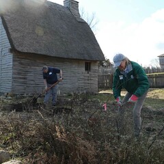 Volunteers garden village clean up day