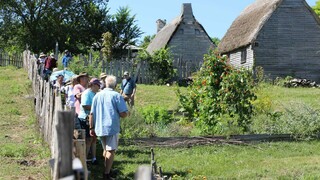 Members tour gardens of the 17th-Century English Village.