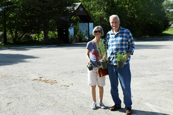 Plant sale customers purchase parking lot