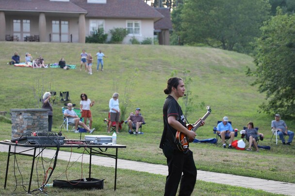 Guitar player lawn indigenous voices series concert