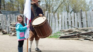 English village young girl flag pilgrim drum