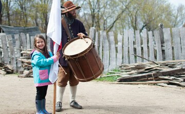 English village young girl flag pilgrim drum