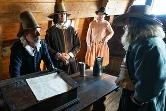 Pilgrims aboard mayflower signing compact