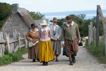 Pilgrims walking english village