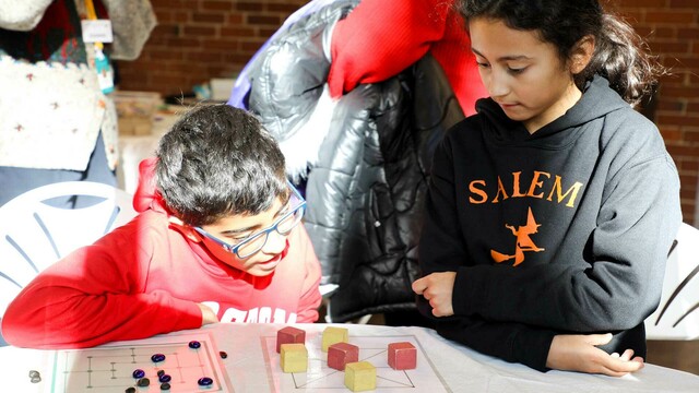 Eventbrite Header kids playing at table October