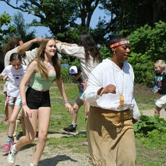 Guests and Educators take part in a traditional Wampanoag dance on the Homesite.