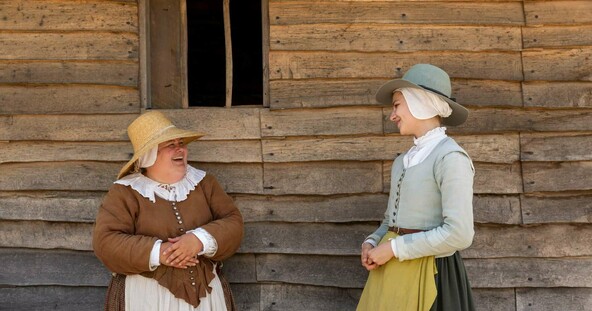 Two pilgrim women talking