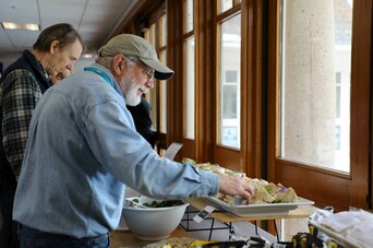 Volunteer gets sandwich