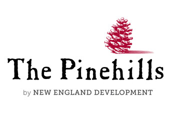 the pinehills by new england development logo