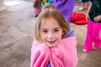 A group of children get ready for an overnight at the museum