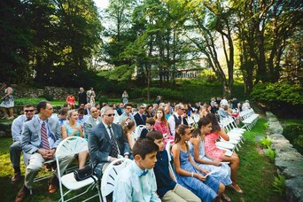 wedding guests in a garden setting