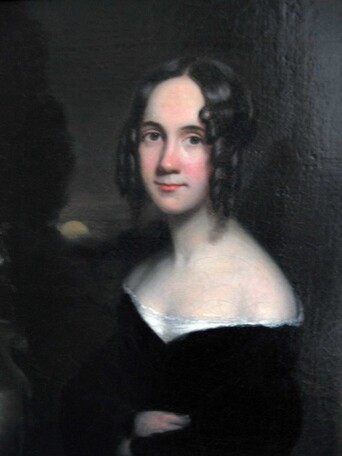 Sarah Josepha Hale in a black dress. Ringlets frame her face.