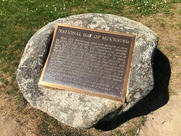 Rock with plaque commemorating the National Day of Mourning