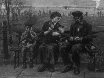 Immigrants at Castle Garden, in New York City, share a meal on a picnic bench.
