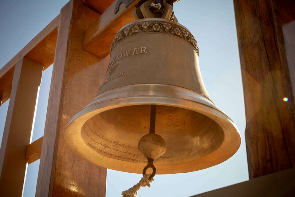 Bell illuminated by golden sunlight