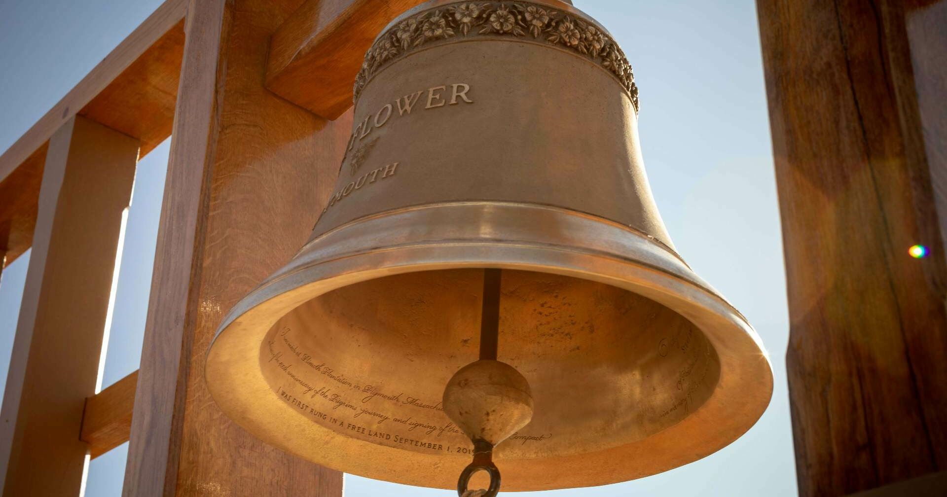 Bell illuminated by golden sunlight