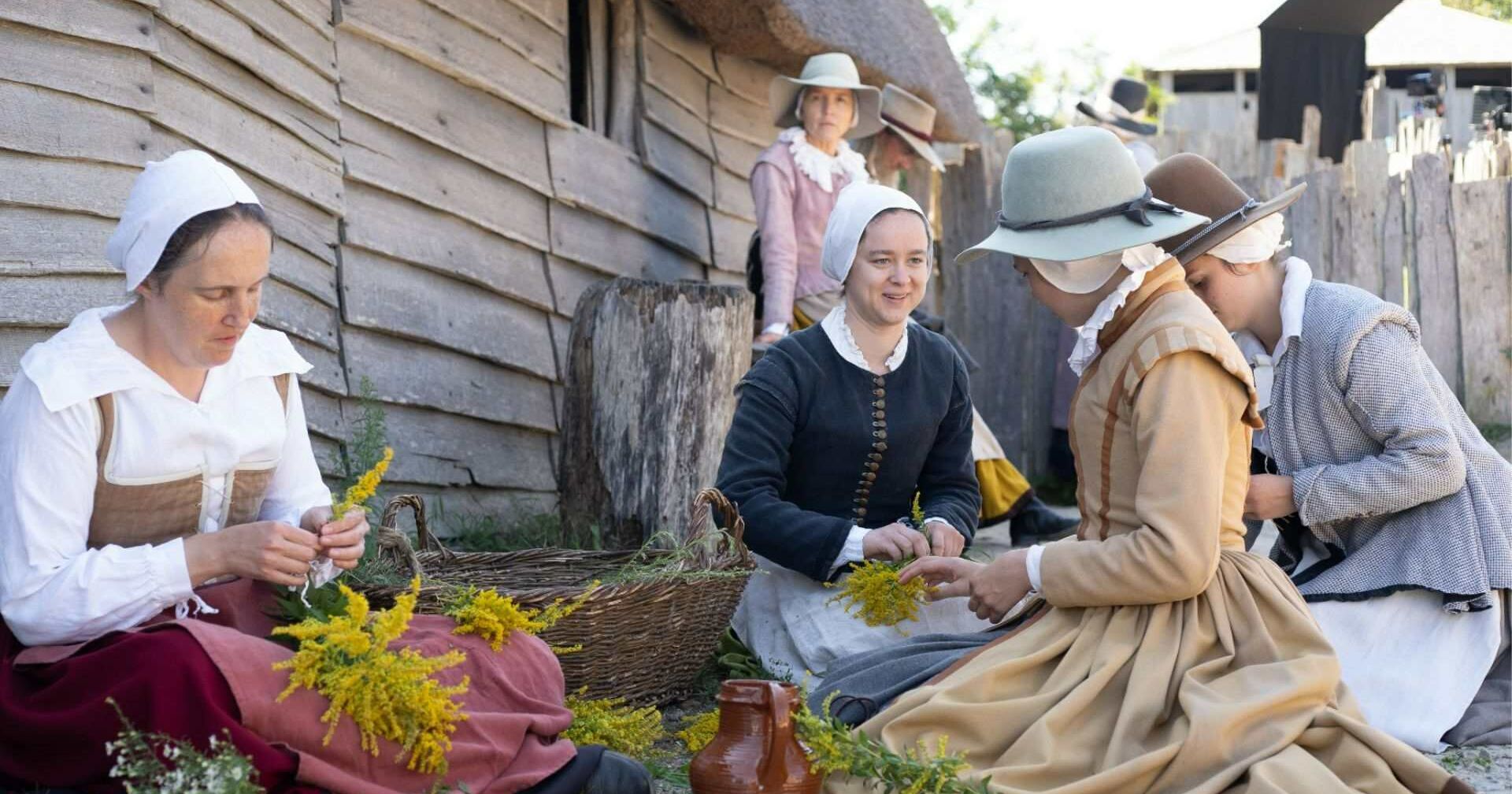 Pilgrim woman gather flowers