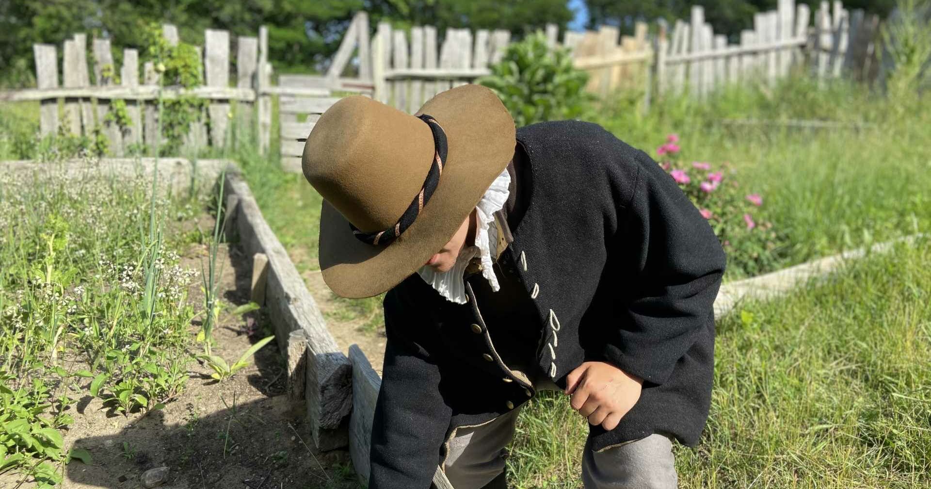 pilgrim man works in garden
